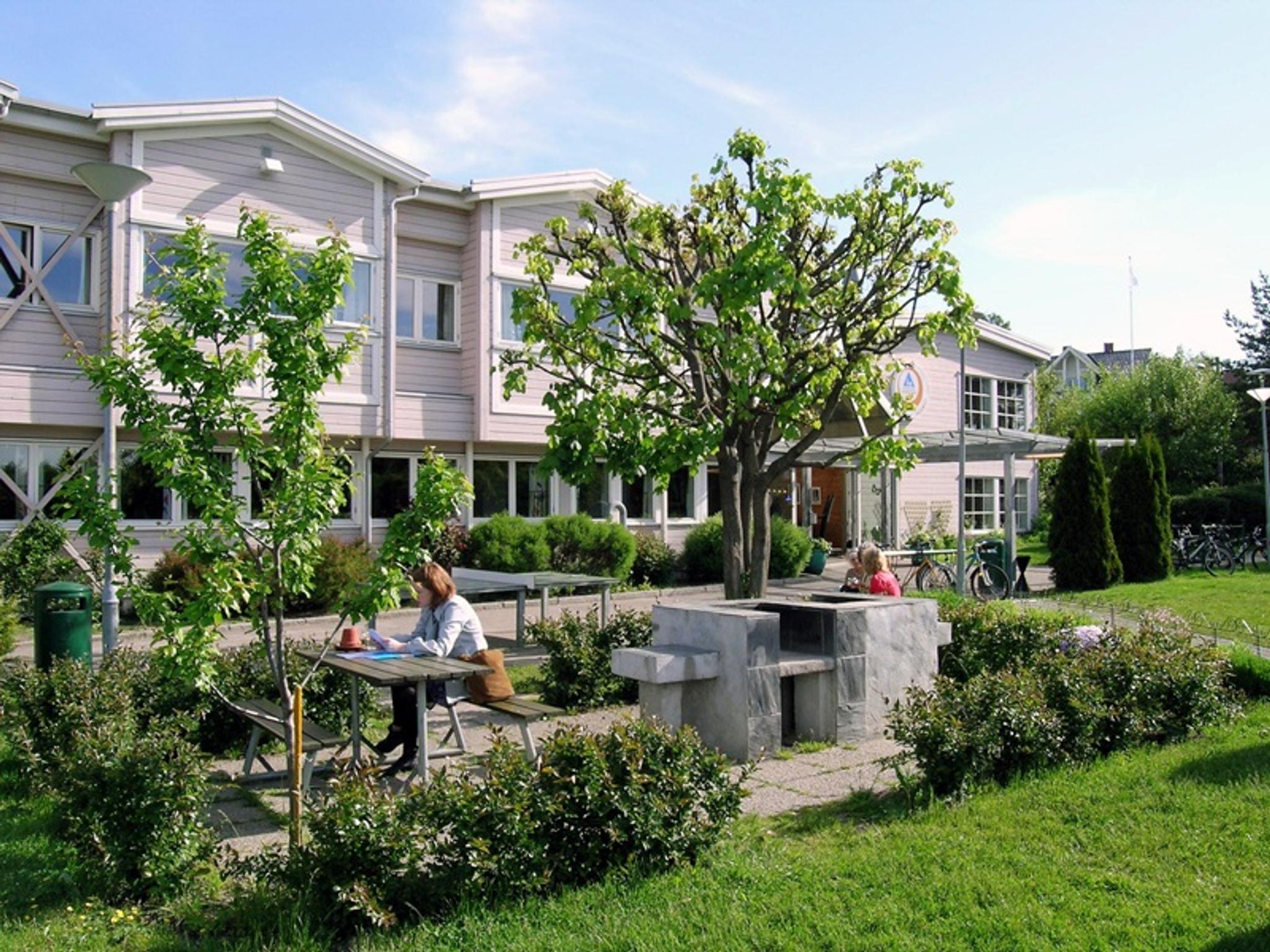 outdoor seating areas with green spaces