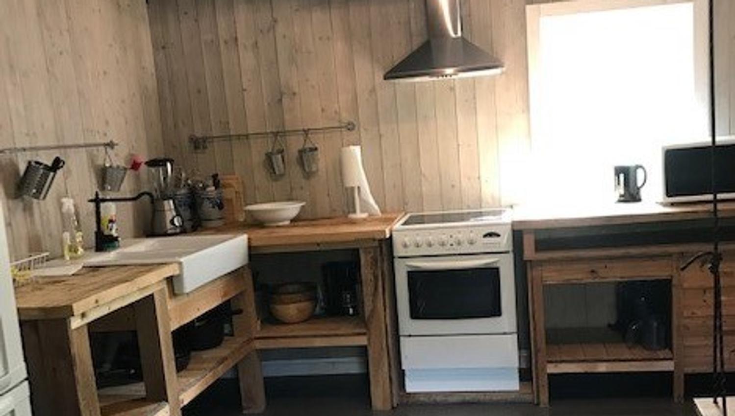 Hønehuset på Nordre Raknerud - Helgøya foto: Helgøya Klatrepark