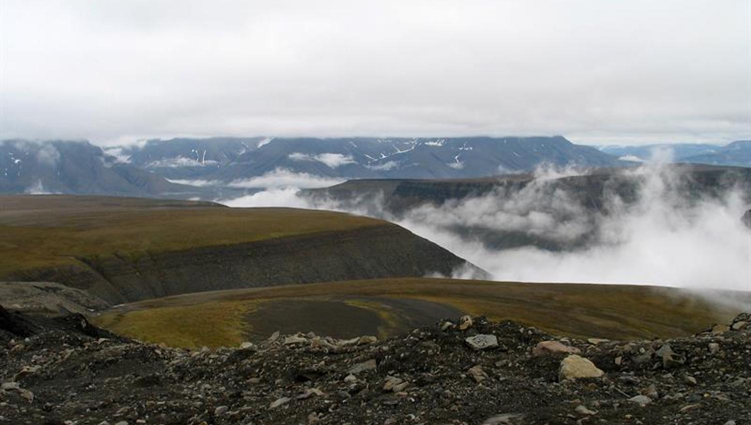 Mountains covered by low clouds and mist