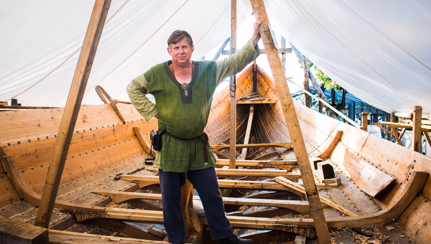 Man standing in Viking ship on Vikingodden in Tønsberg