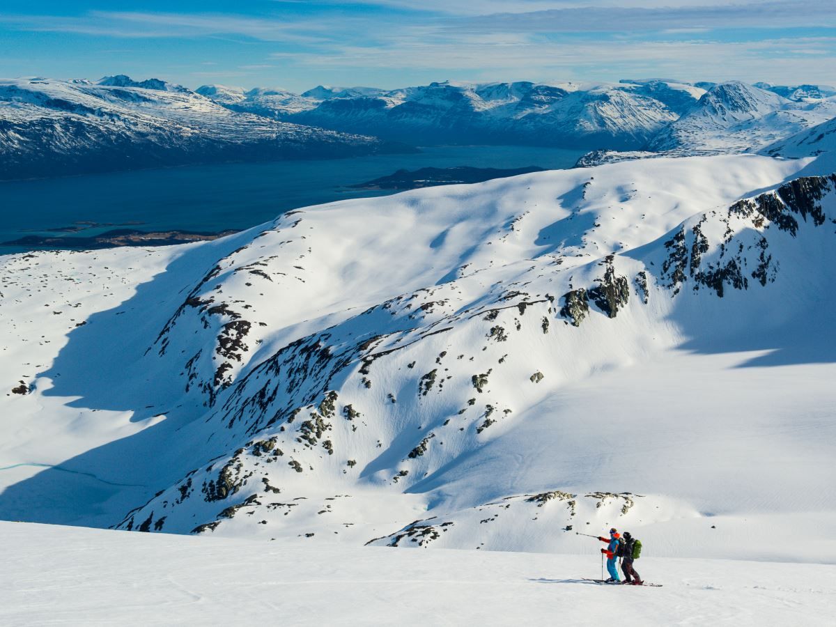 Two persons skiing in the mountain