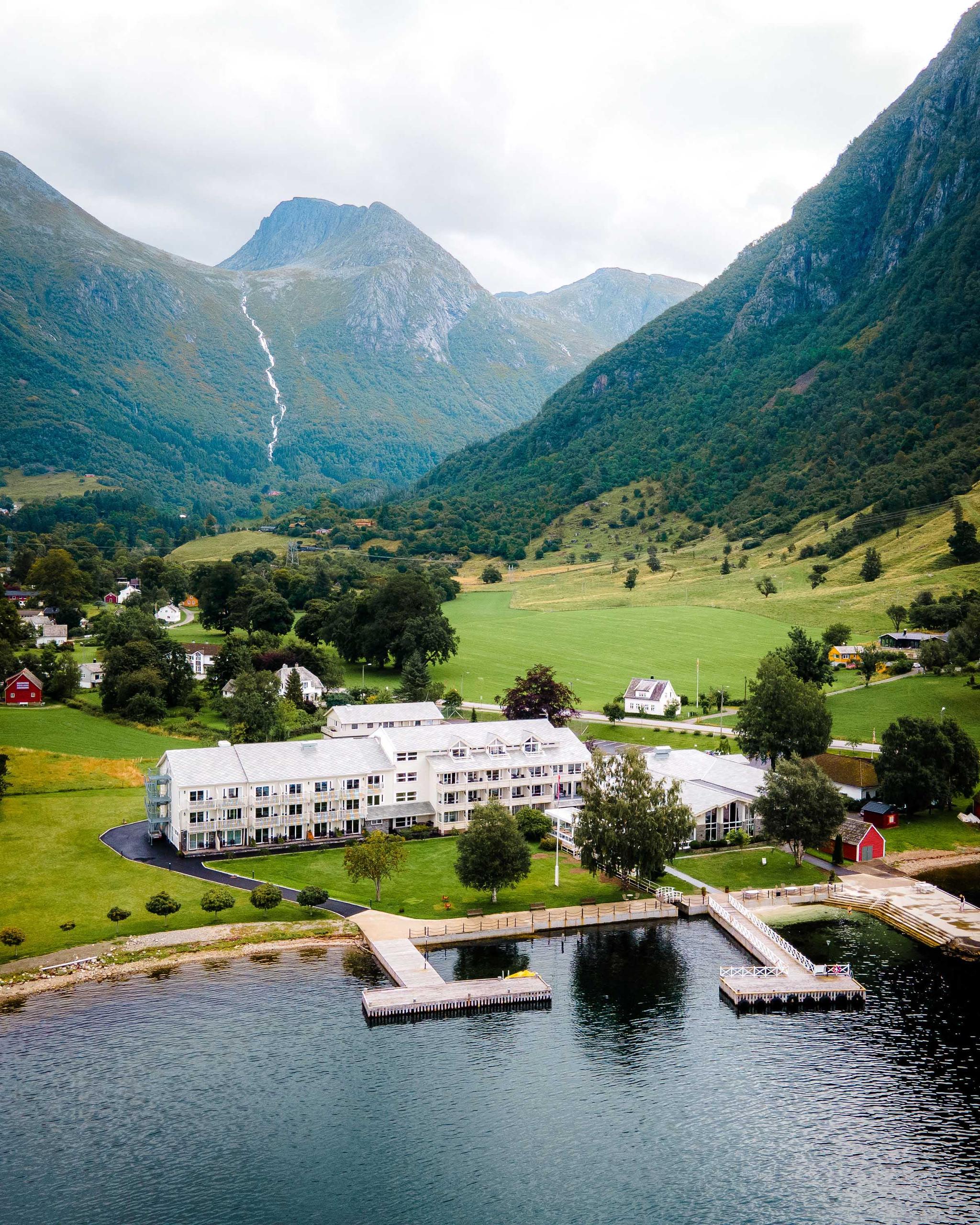 Rosendal Fjordhotel surrounded by stunning fjord and mountain scenery in Hardanger.