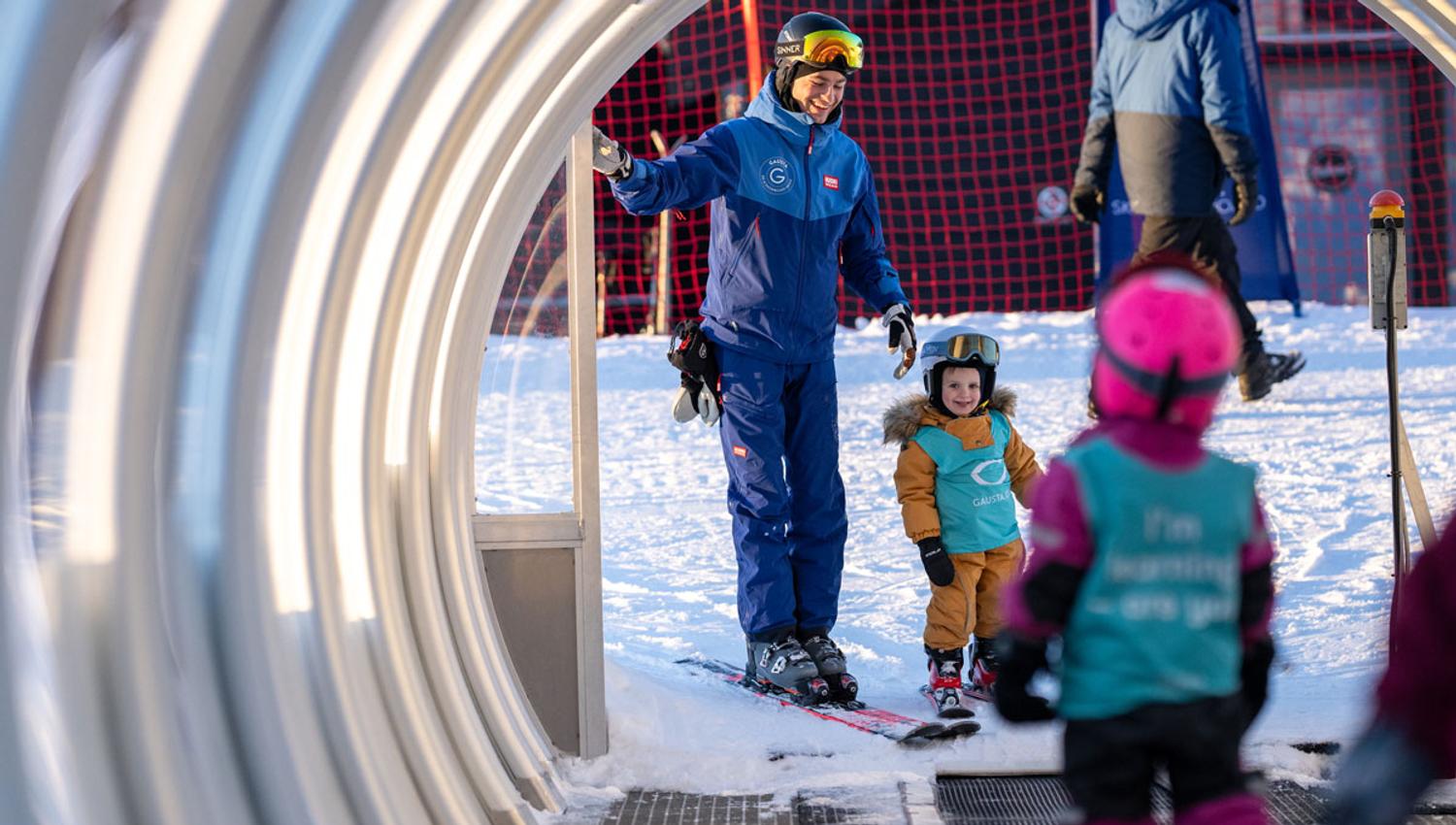 mother with child in the ski lift at Gausta ski center
