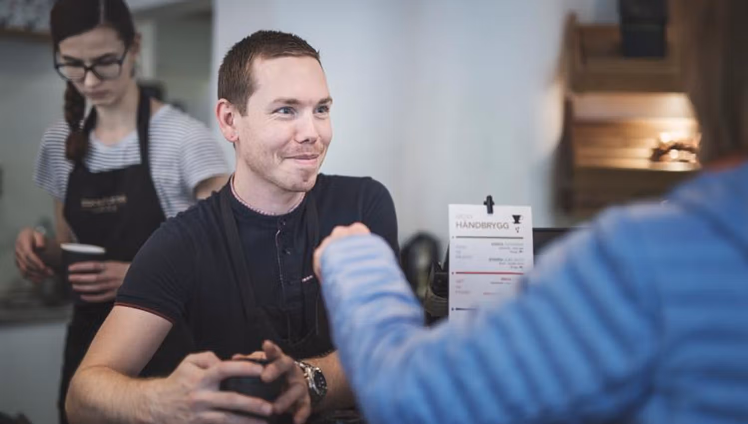 employee in conversation with a customer