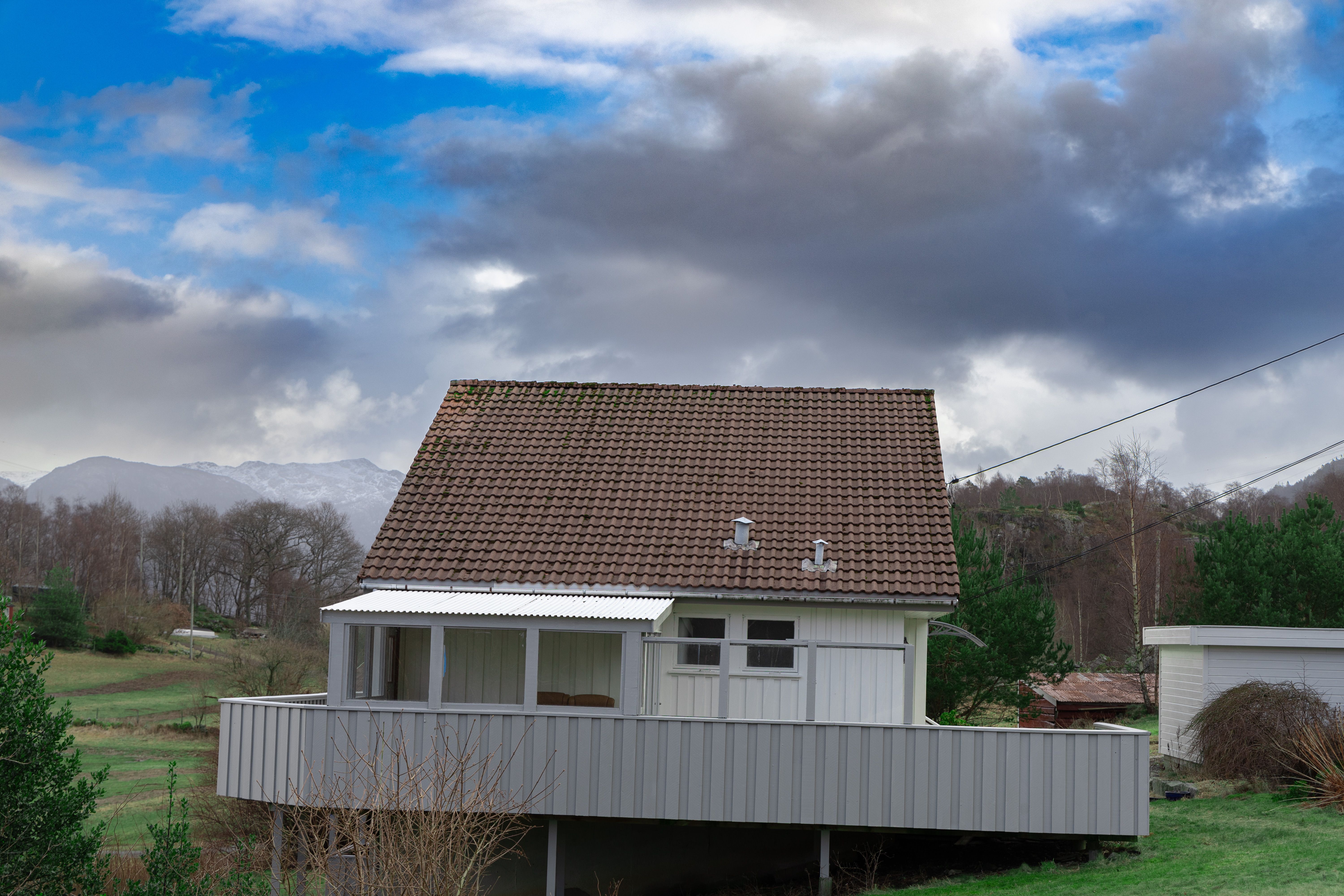 The house has a terrace and green space