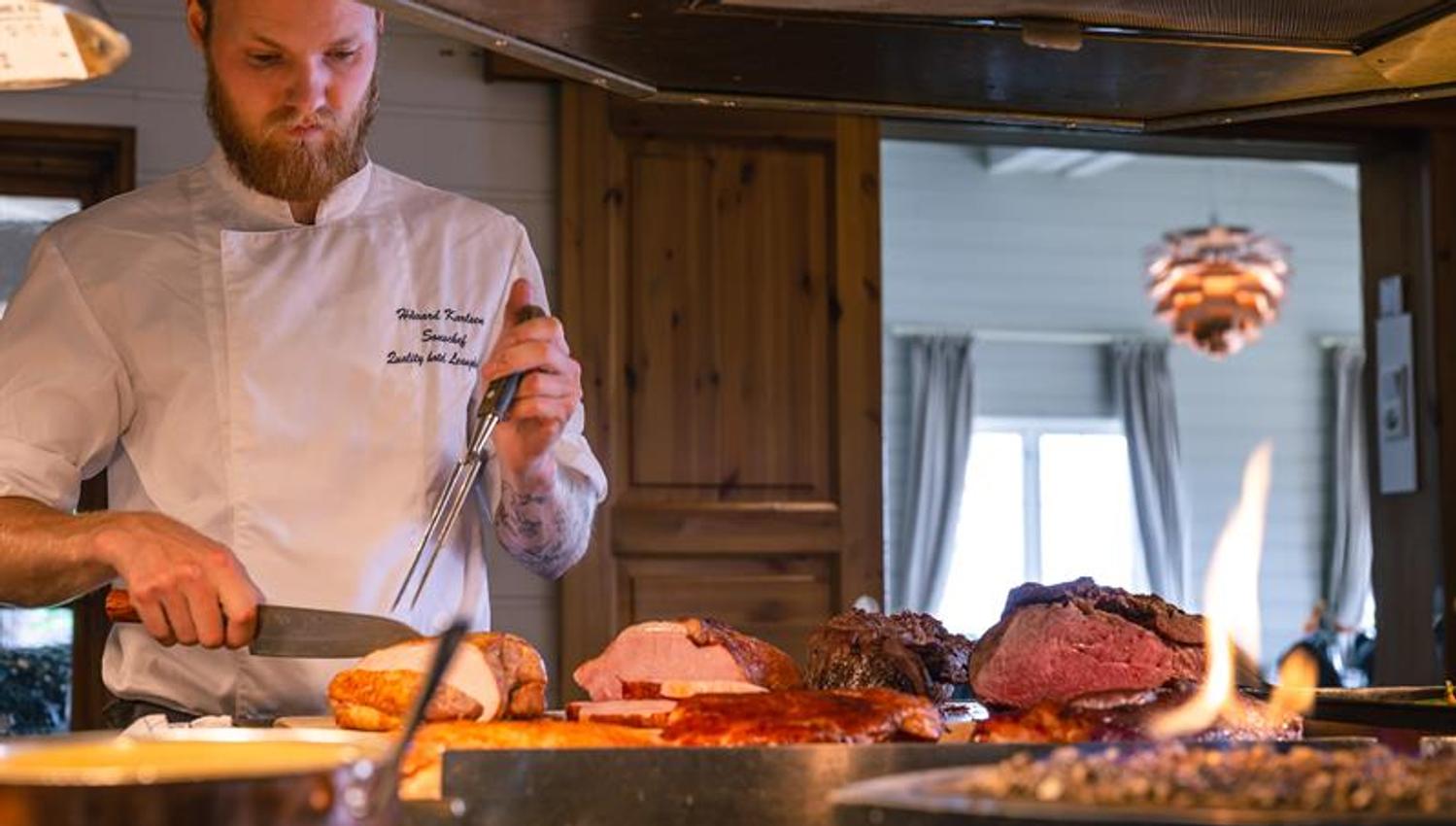 Cook cutting meat