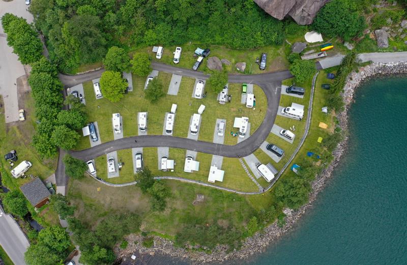 Aerial view of Trolltunga Camping with motorhome pitches along the fjord.