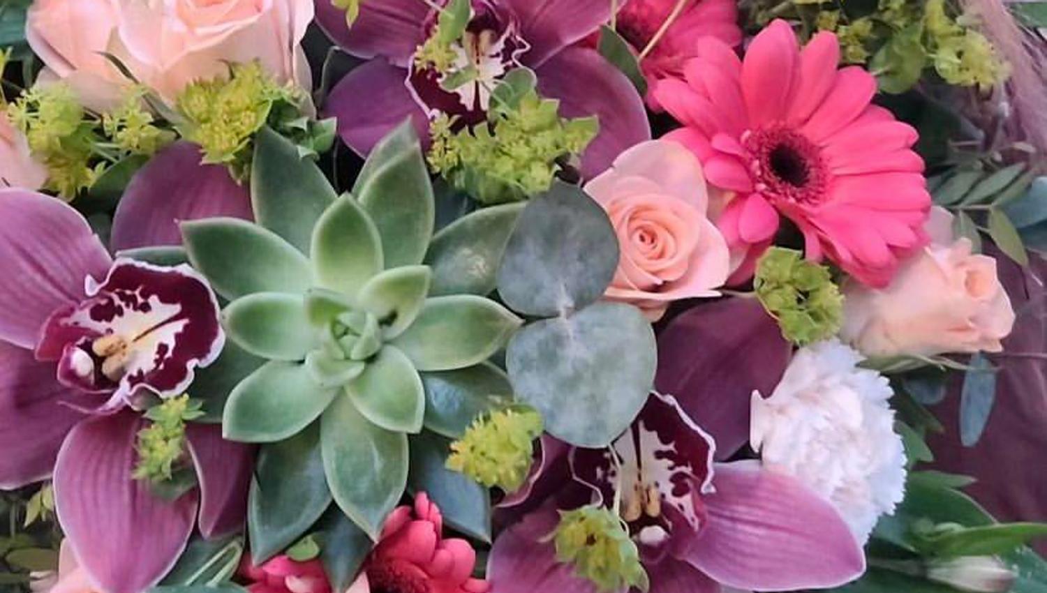 A beautiful bouquet of flowers in shades of pink