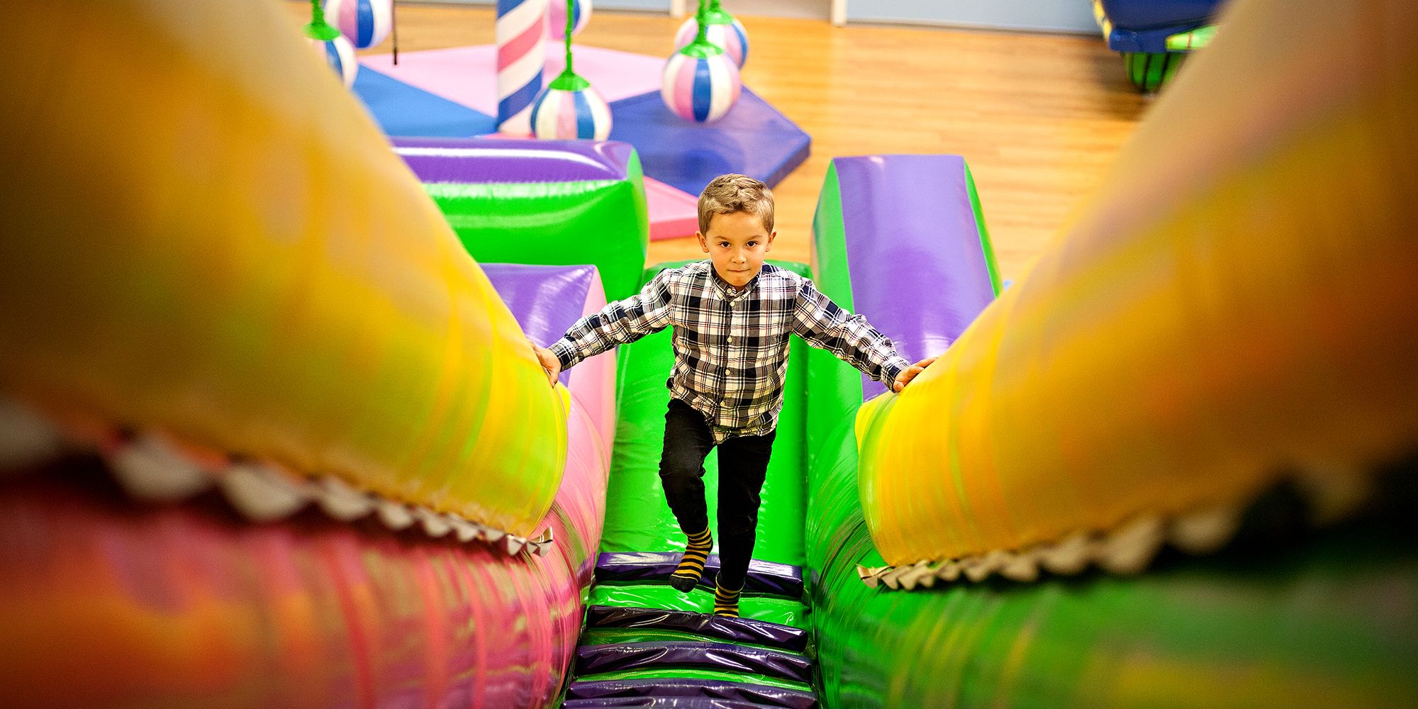 Lykkeland, a play centre in Steinkjer - boy ascending to the slide