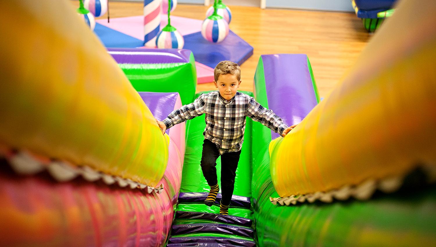 Lykkeland, a play centre in Steinkjer - boy ascending to the slide