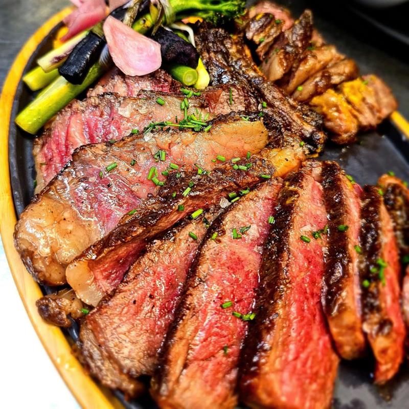 Detail of steak with accessories