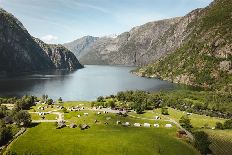 A drone photo of the campground, with the Eidfjord lake in the background.