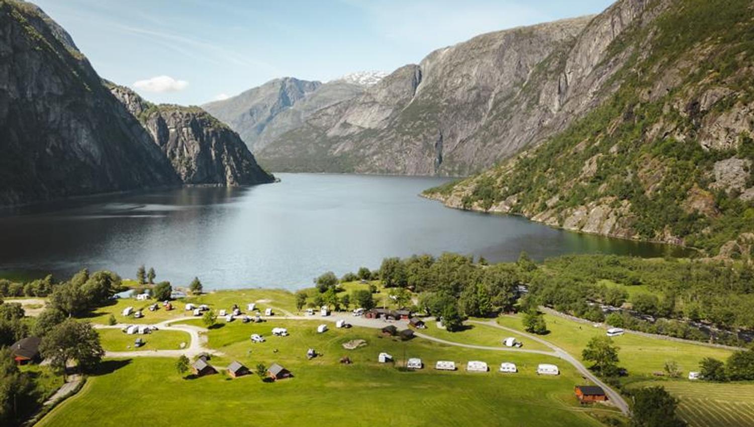 A drone photo of the campground, with the Eidfjord lake in the background.