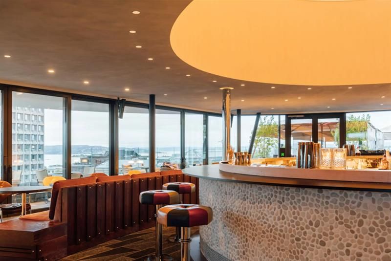 The bar and a view of the fjord from outside.