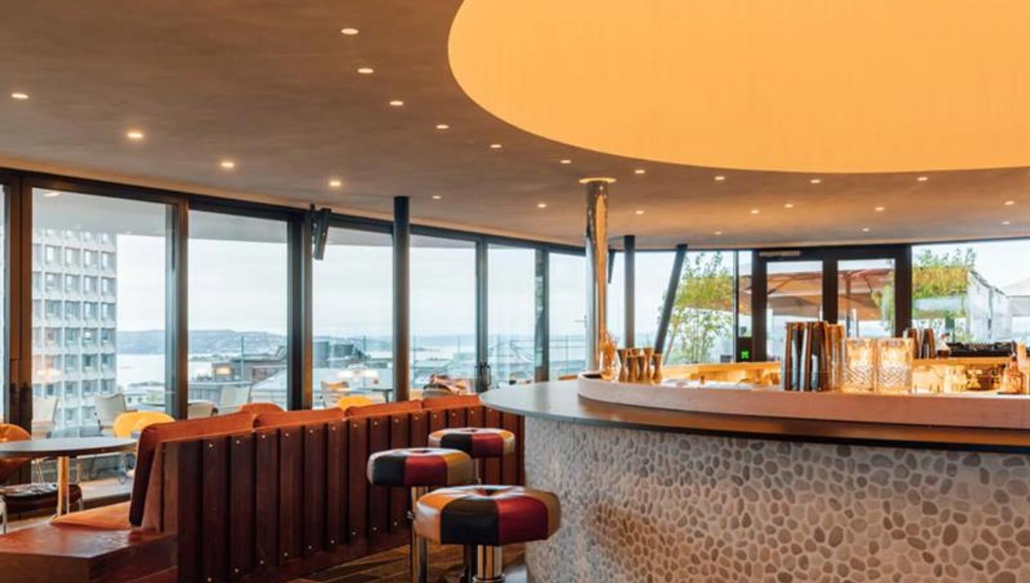 The bar and a view of the fjord from outside.