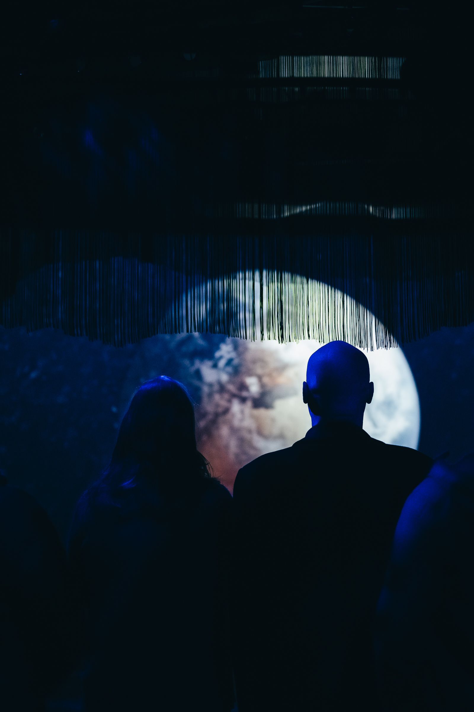 Two people looking at an exhibition at Salmon Eye