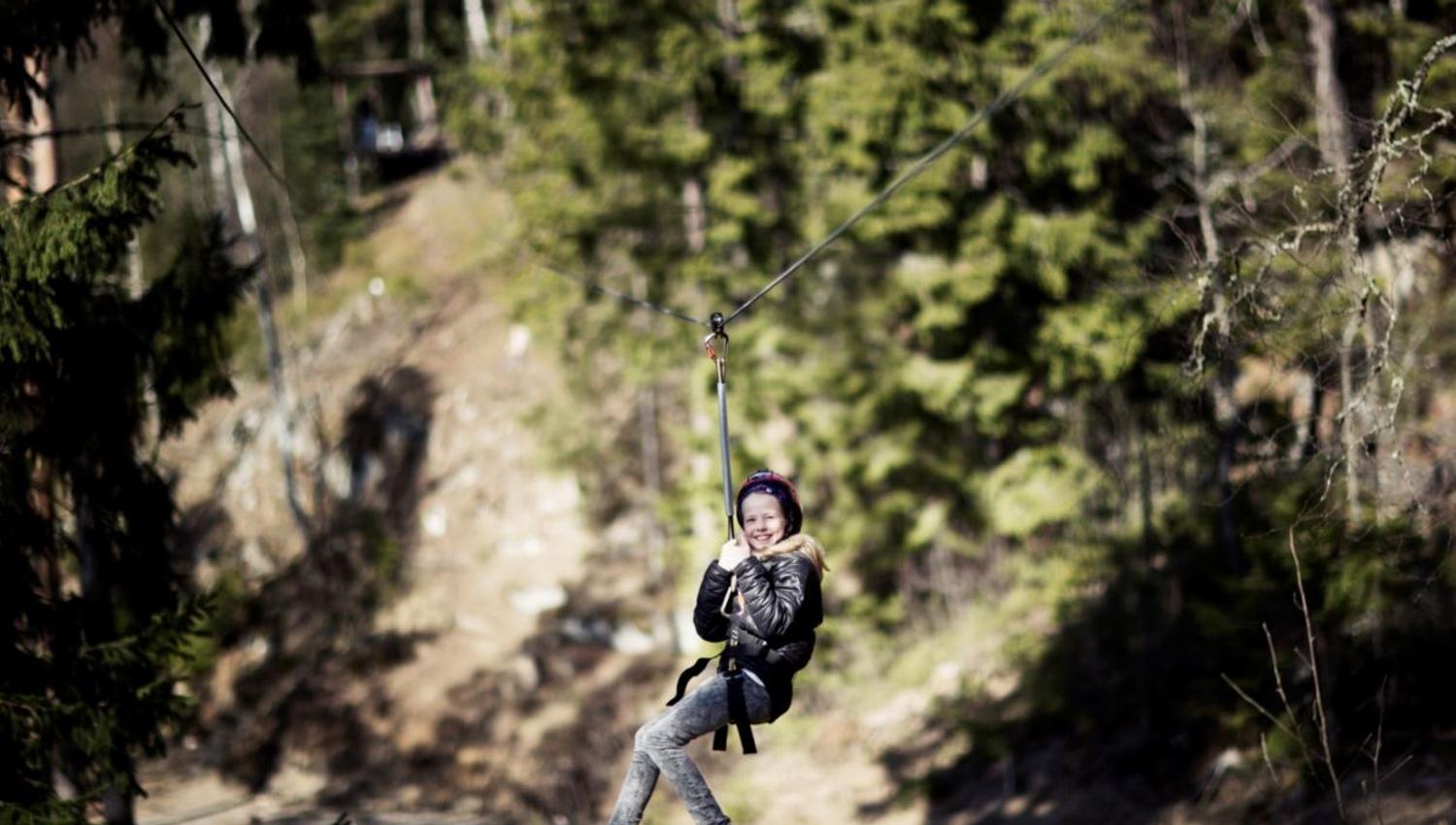 girl taking the zipline