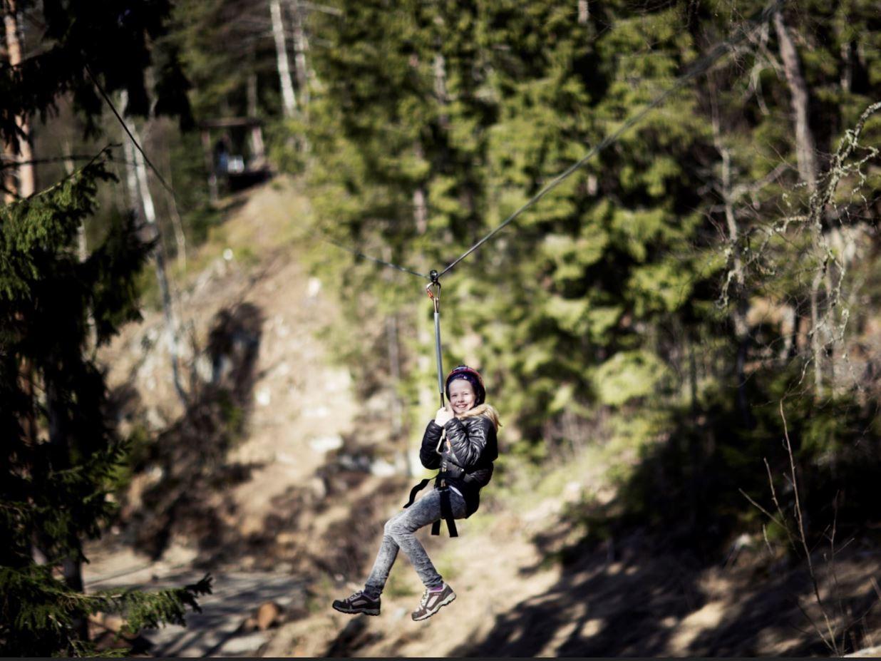 girl taking the zipline