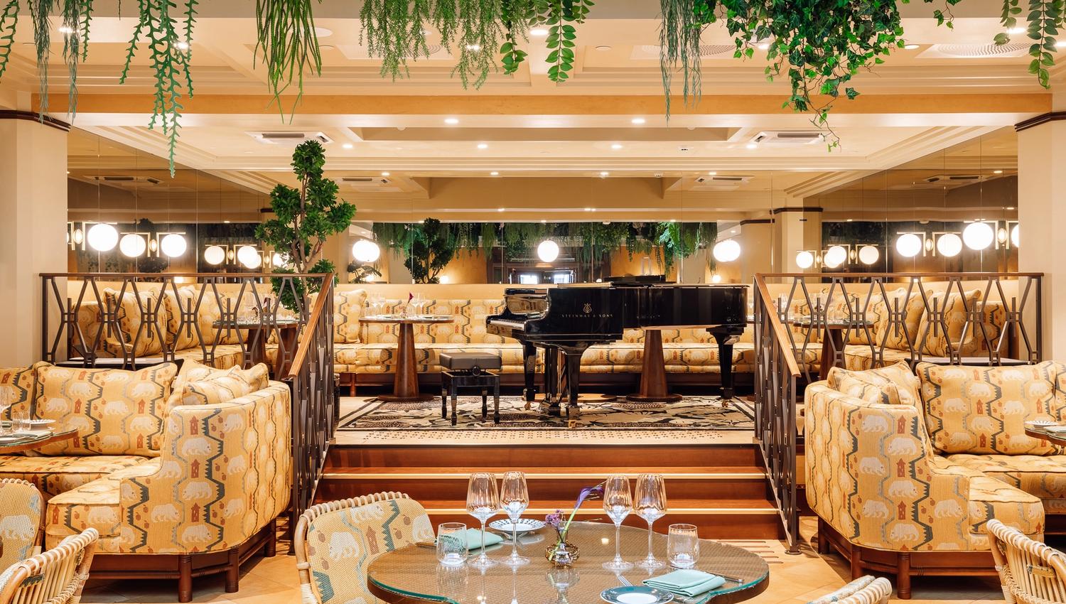 Seating sections and a grand piano