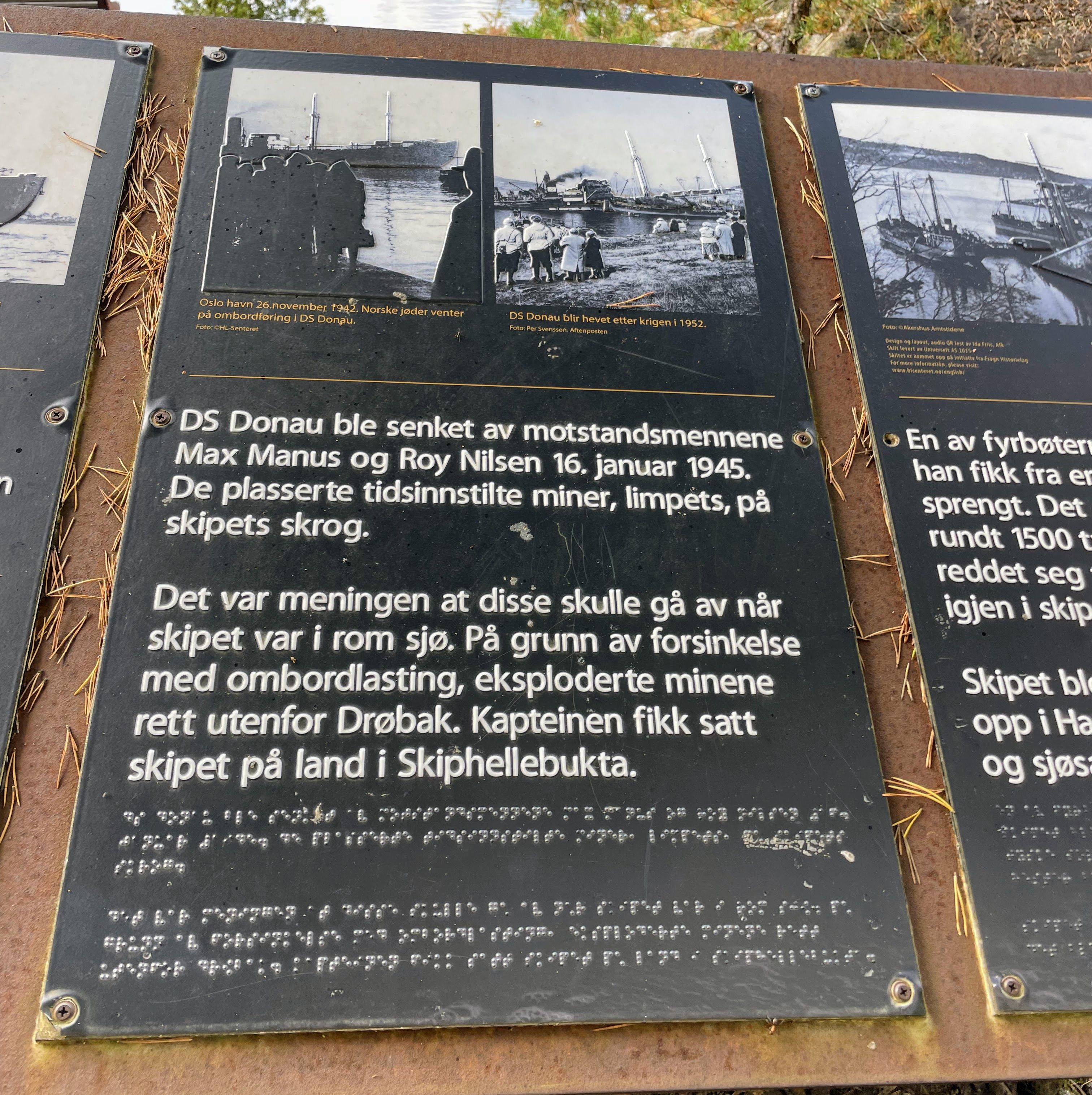 Sign with text and picture of DS Donau that was sunk