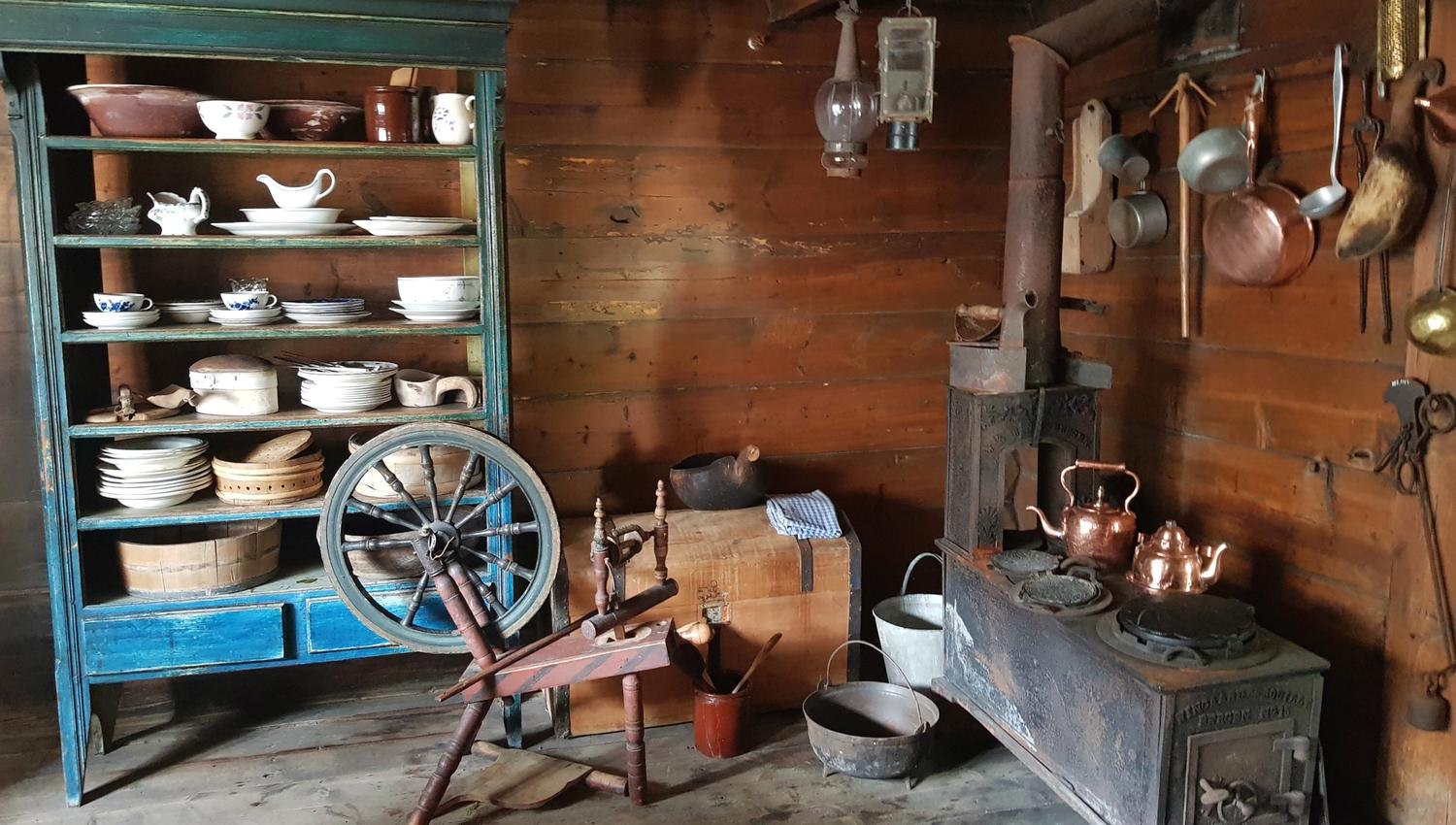 A kitchen with various kinds of utensils