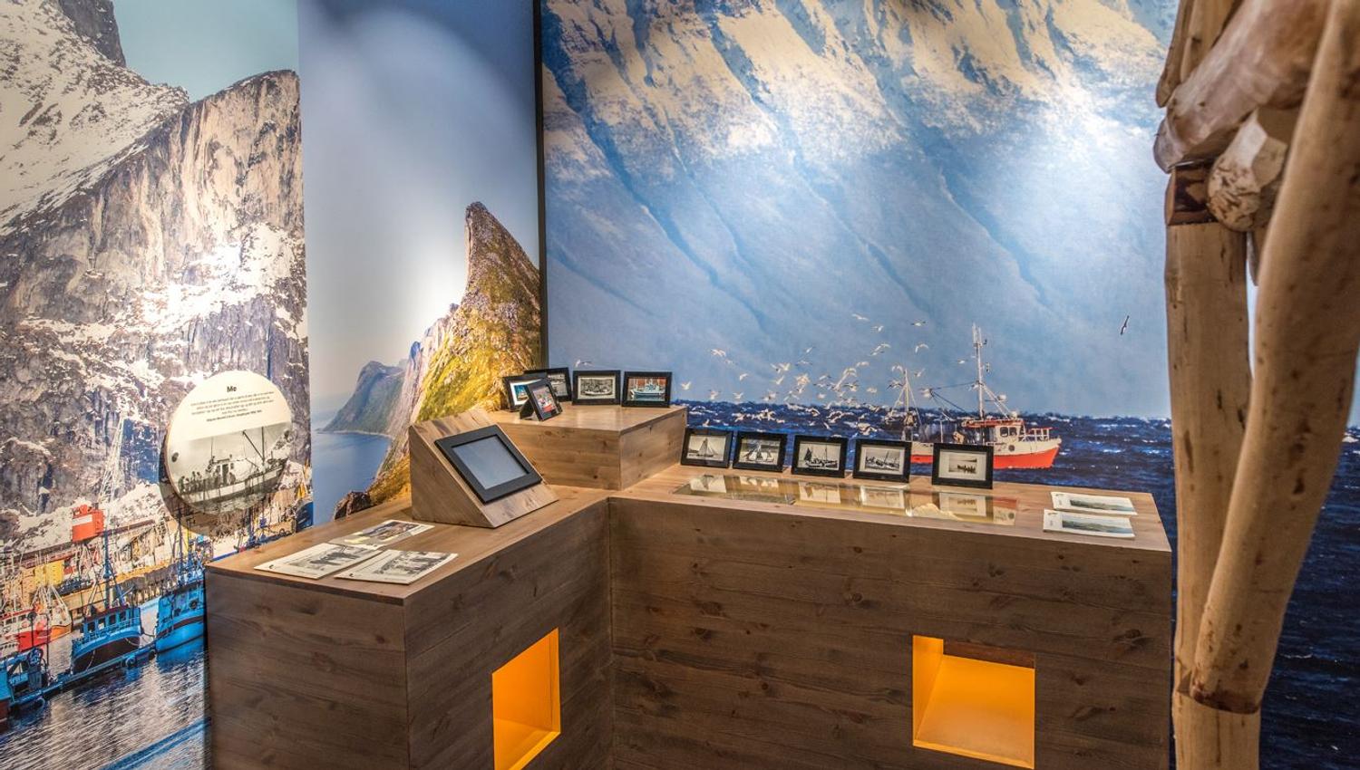 Inside the Sámi museum with pictures covering the walls.