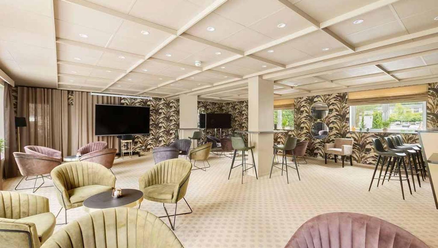 Cozy bar area where you can socialize and spend time in newly renovated surroundings with a pleasant atmosphere.