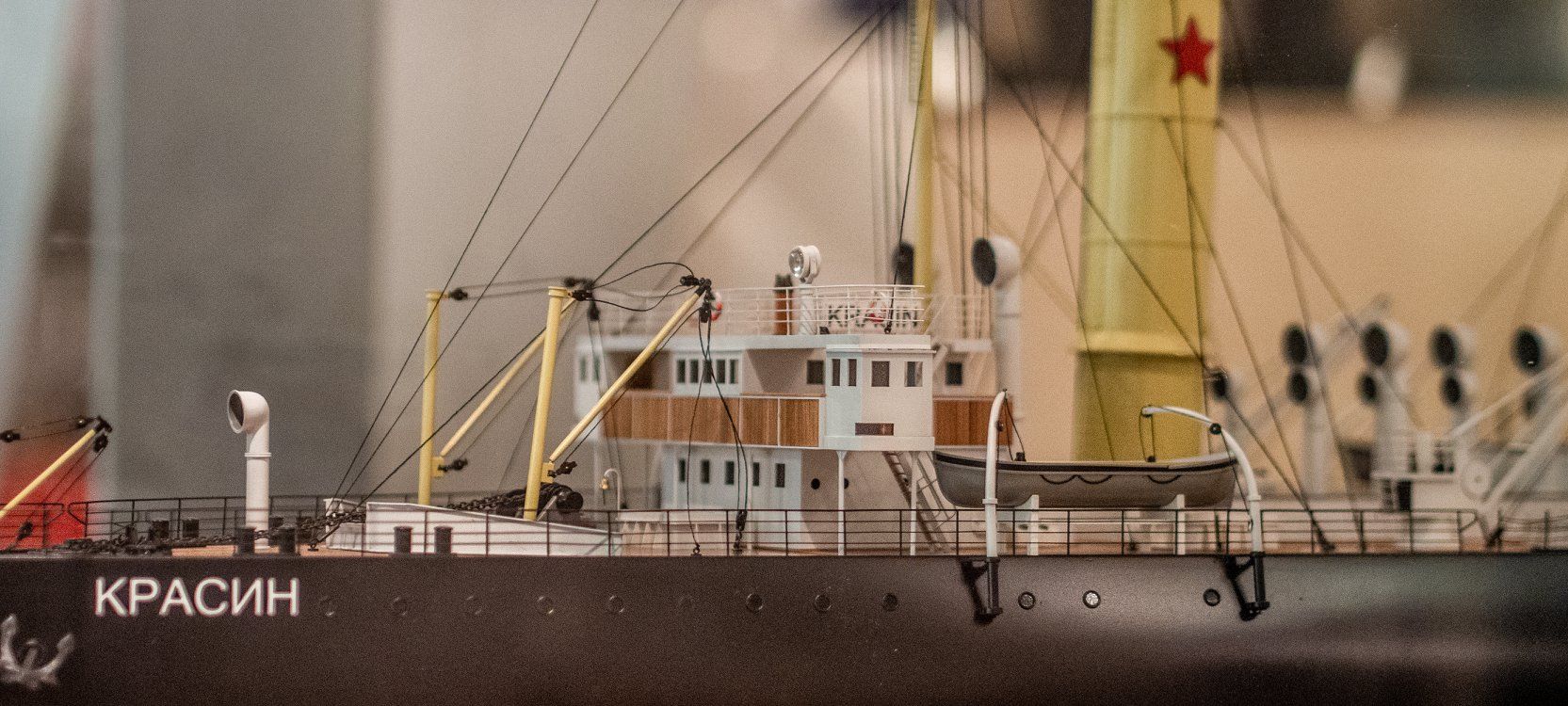 A miniature boat model inside the museum