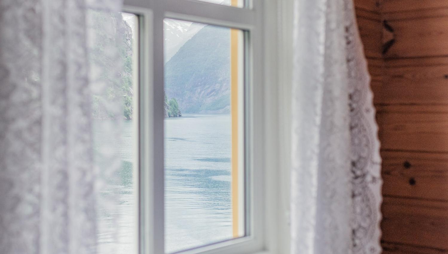 View from the bedroom at Stana Farm – the Hardangerfjord and Folgefonna glacier just outside the window.