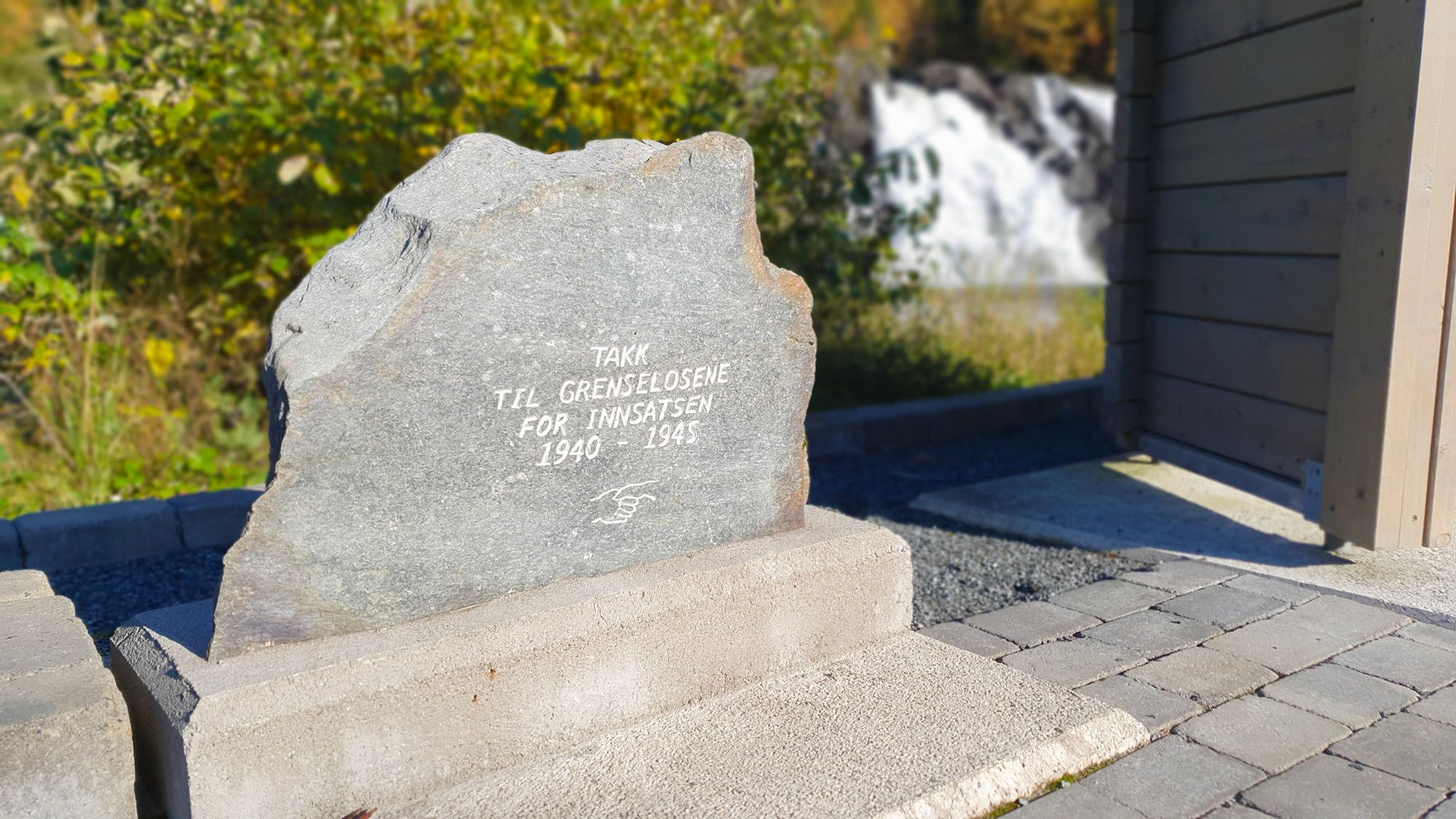 The memorial stone thanking the border guides from WWII at Skjækerfossen Waterfall in Vuku, Verdal