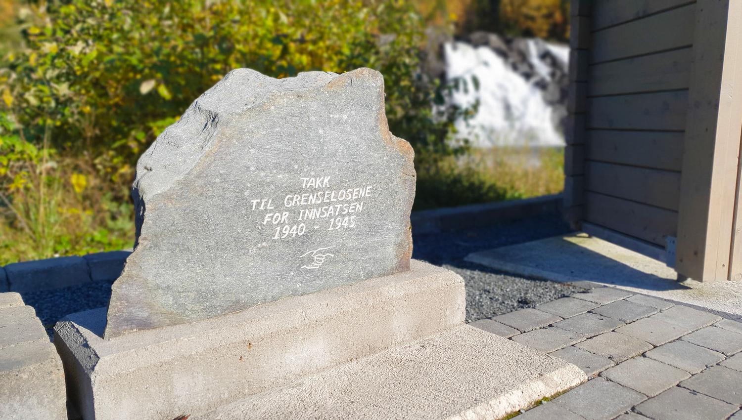 The memorial stone thanking the border guides from WWII at Skjækerfossen Waterfall in Vuku, Verdal