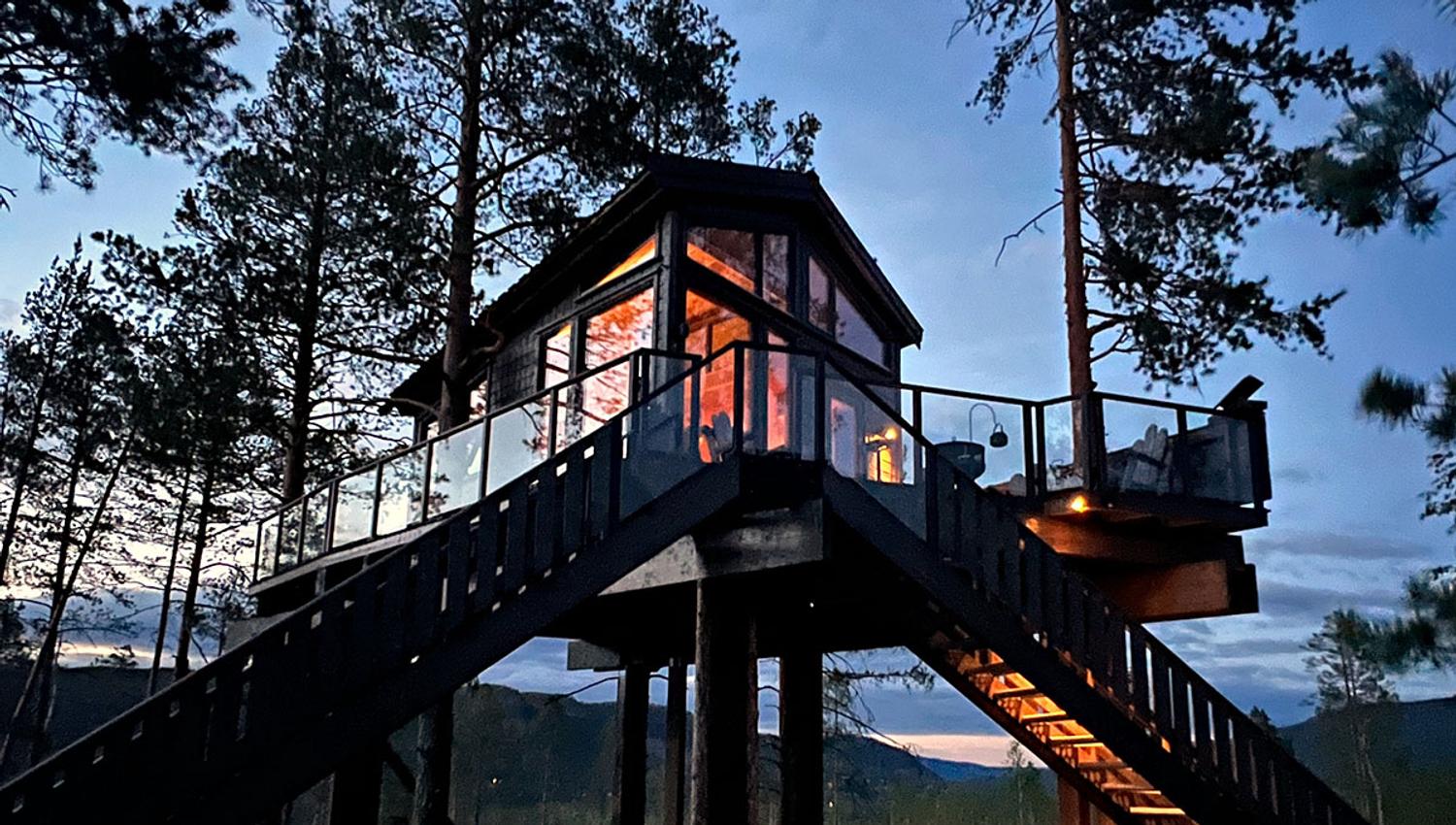 Tree top cabin during sunset