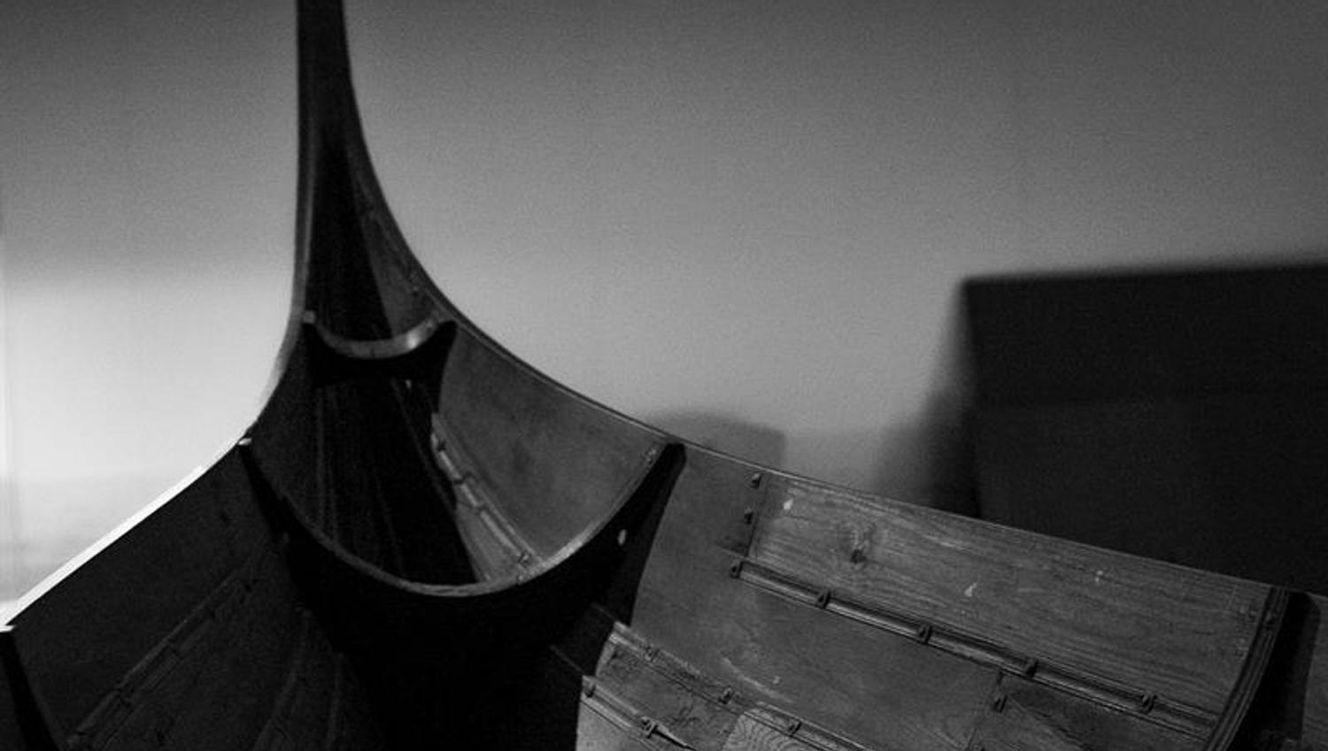Black and white photo of viking boat.