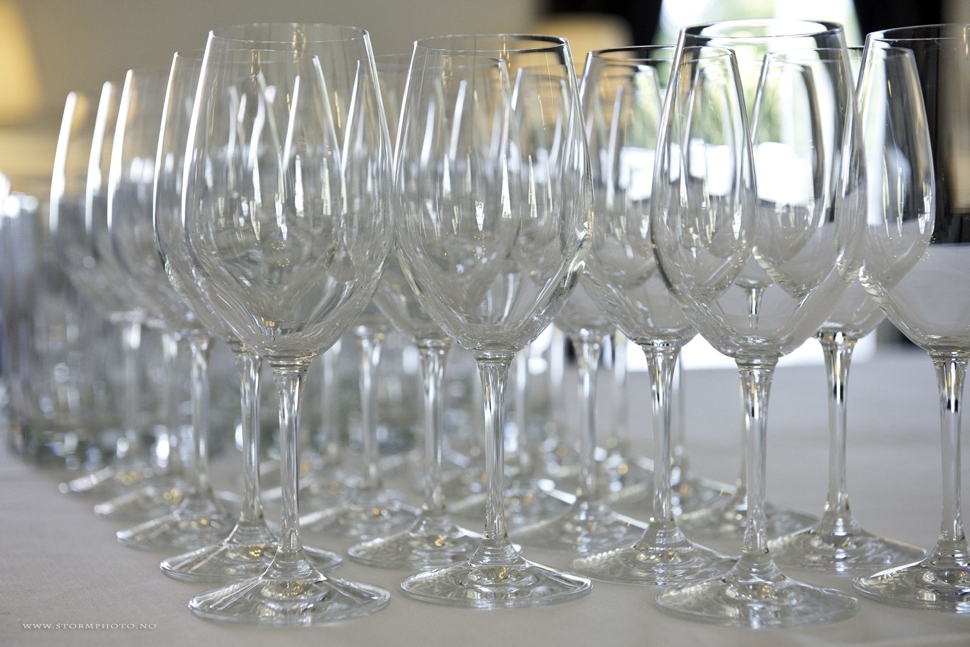Wine glasses stand ready for a party 