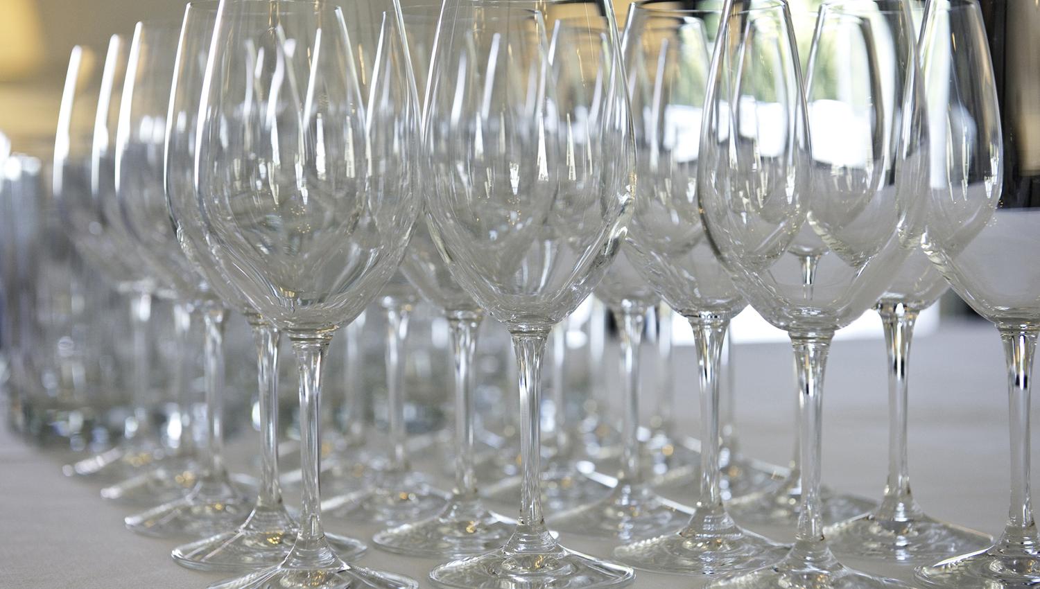 Wine glasses stand ready for a party