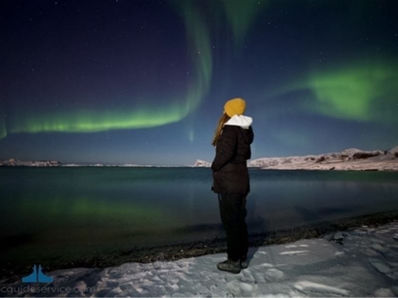 A guest looking at the northern lights