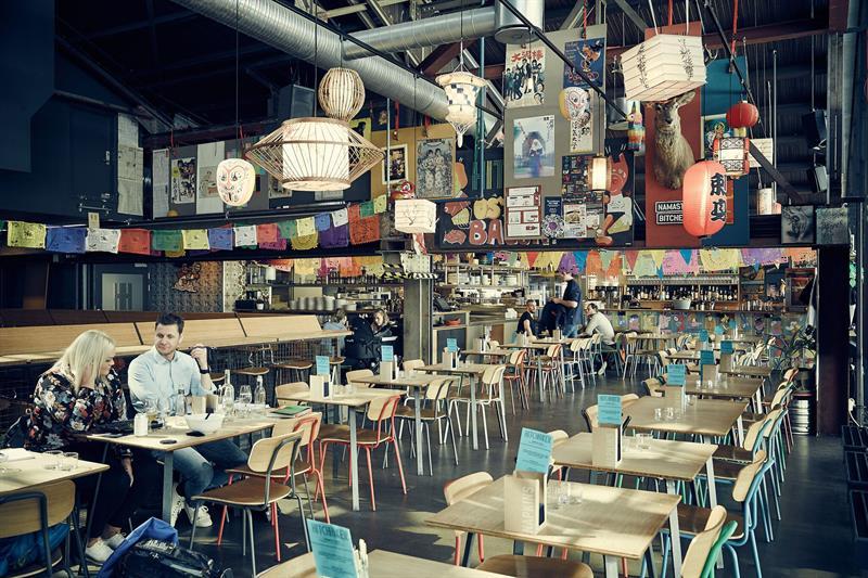 Large dining area with many small tables.