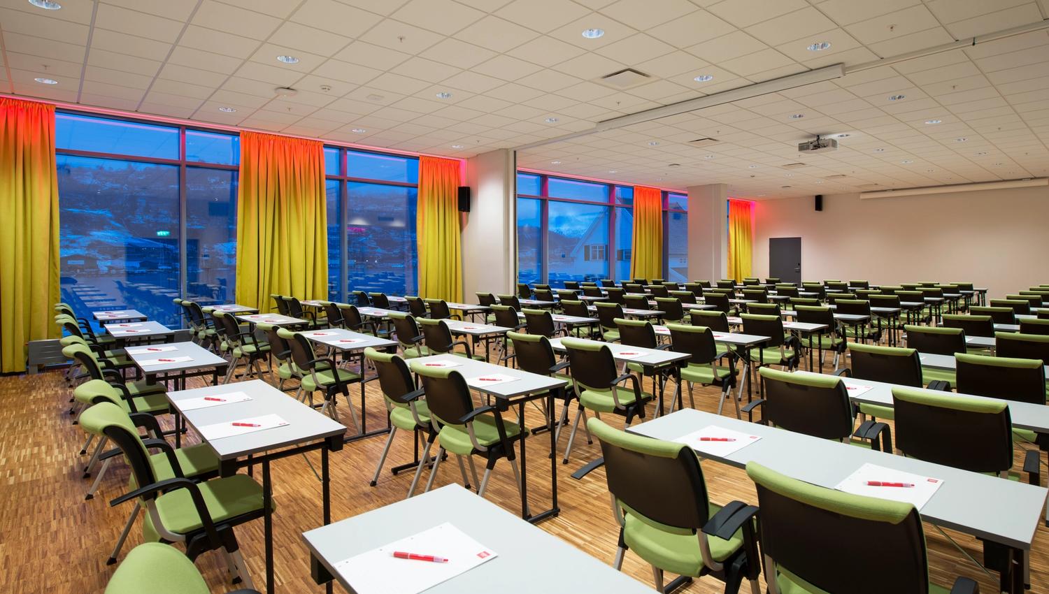 Well-equipped conference room at Thon Hotel Sandven, ideal for meetings with panoramic views of the Hardangerfjord.