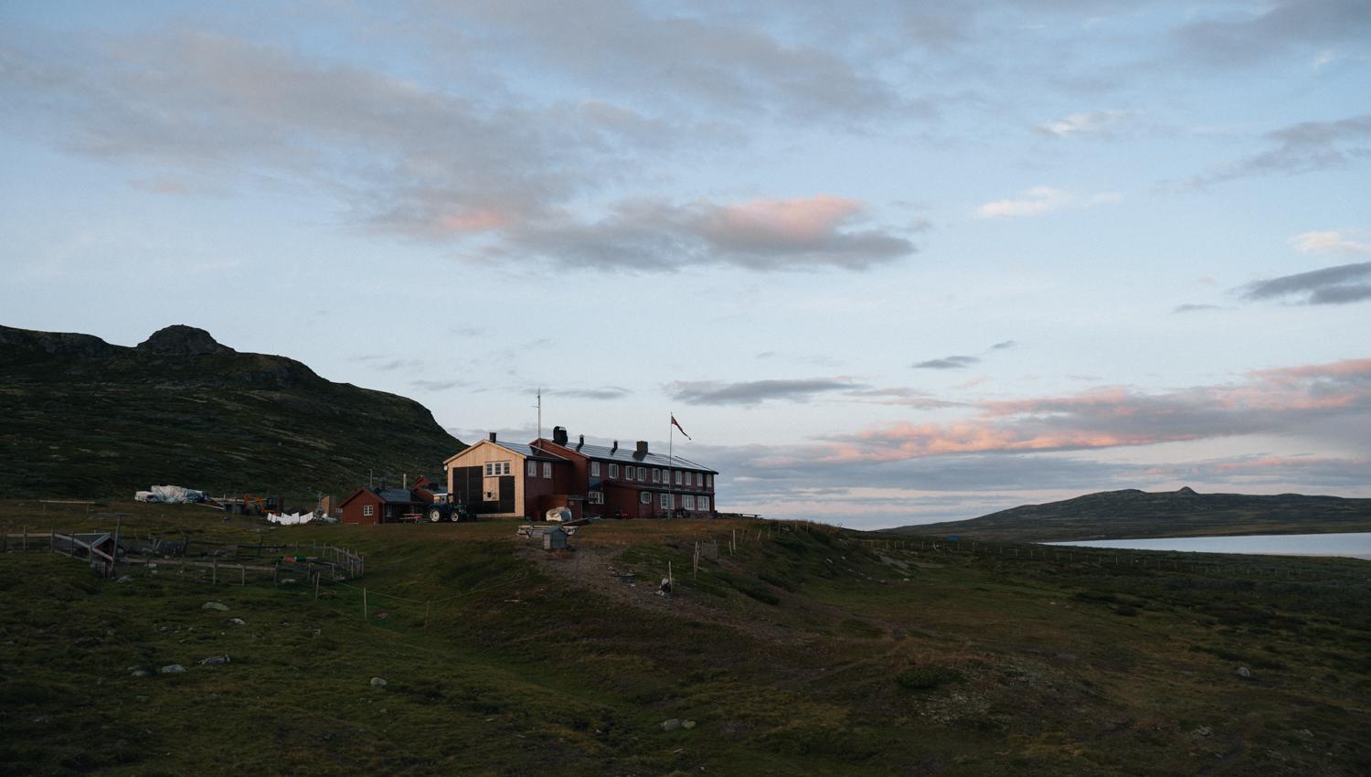 Rauhelleren mountain lodge during a sunset evening.