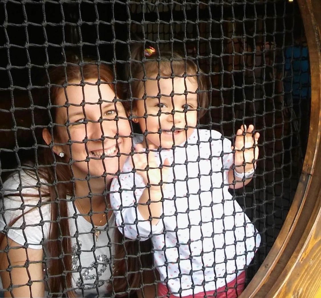 Child and mother in playland