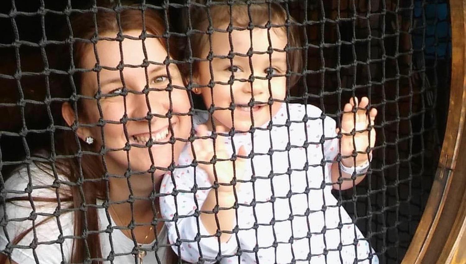 Child and mother in playland