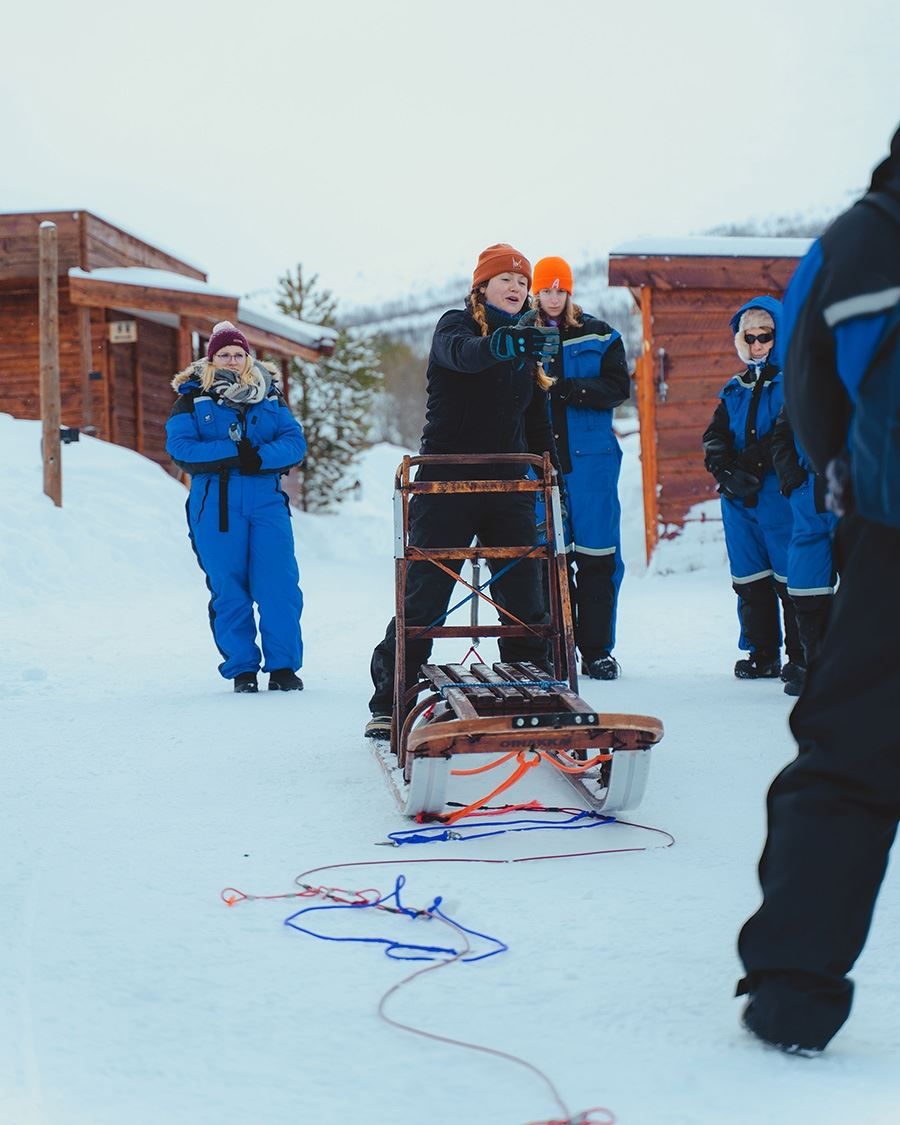 Guests learn how to drive the sled