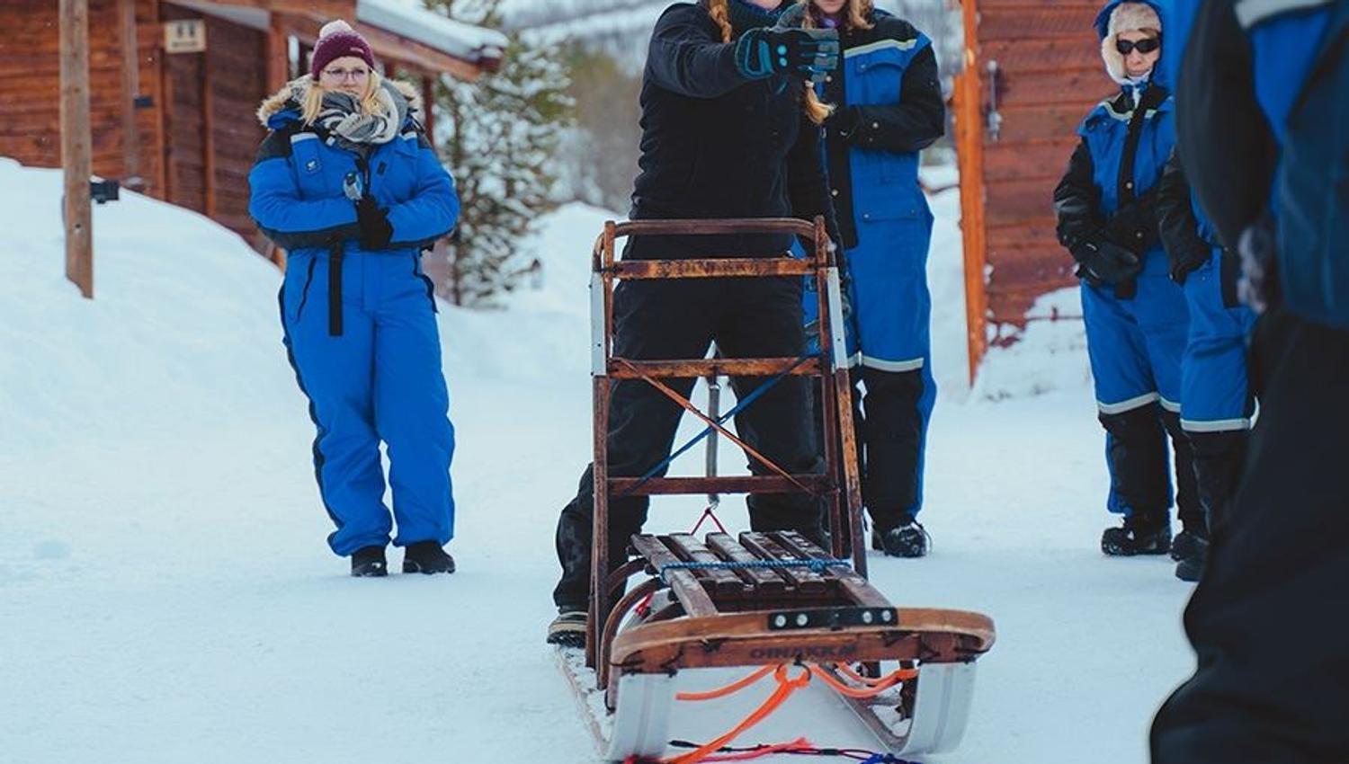 Guests learn how to drive the sled