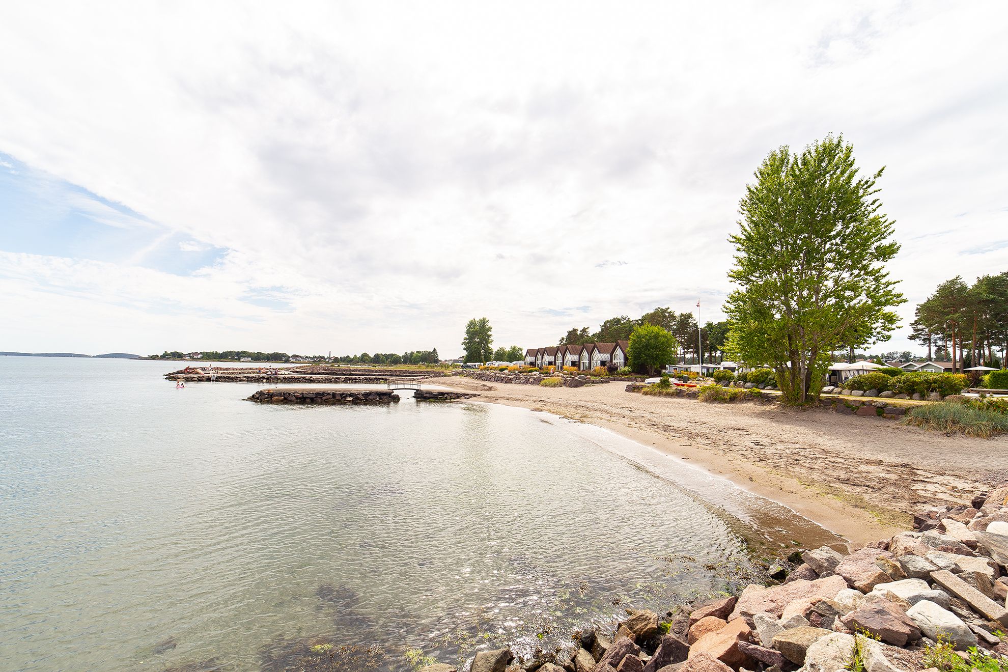 Own beach at Furustrand cabins and camping