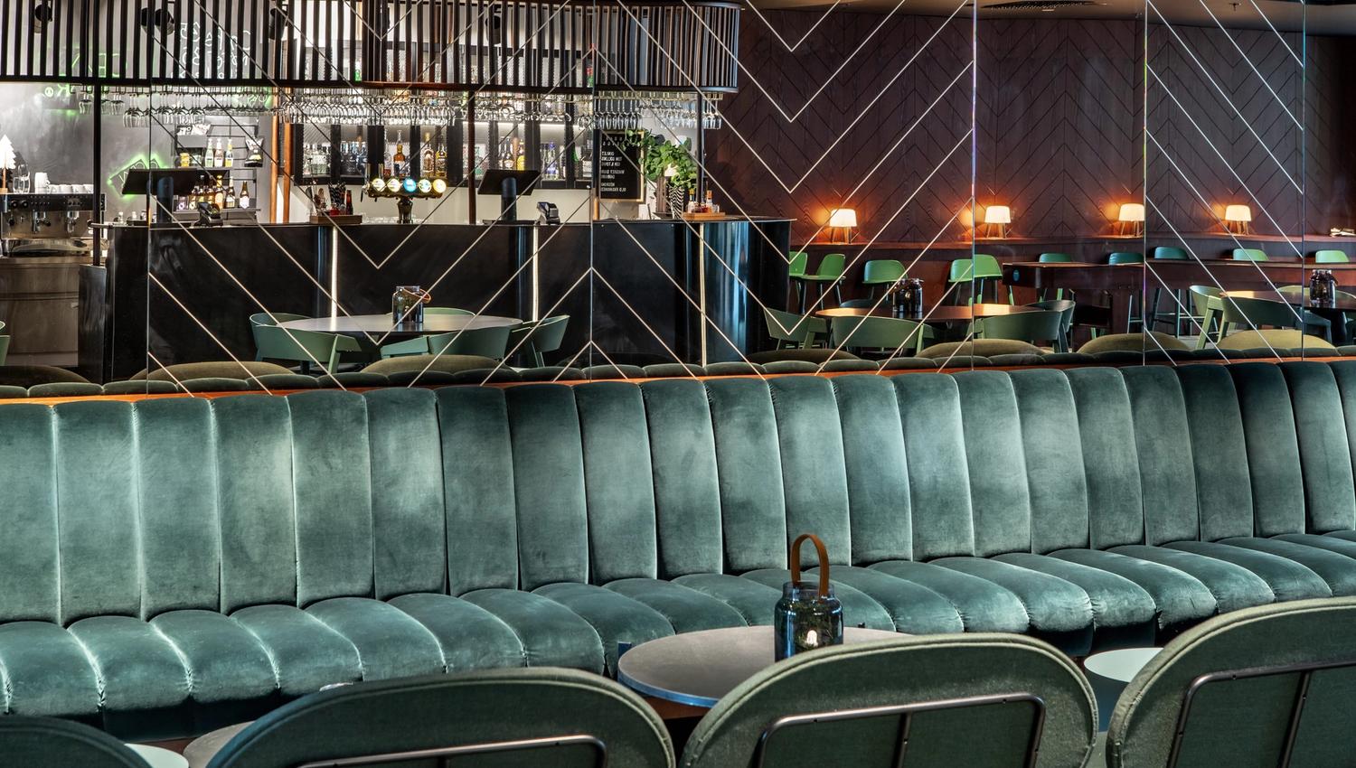 green sofa in a bar