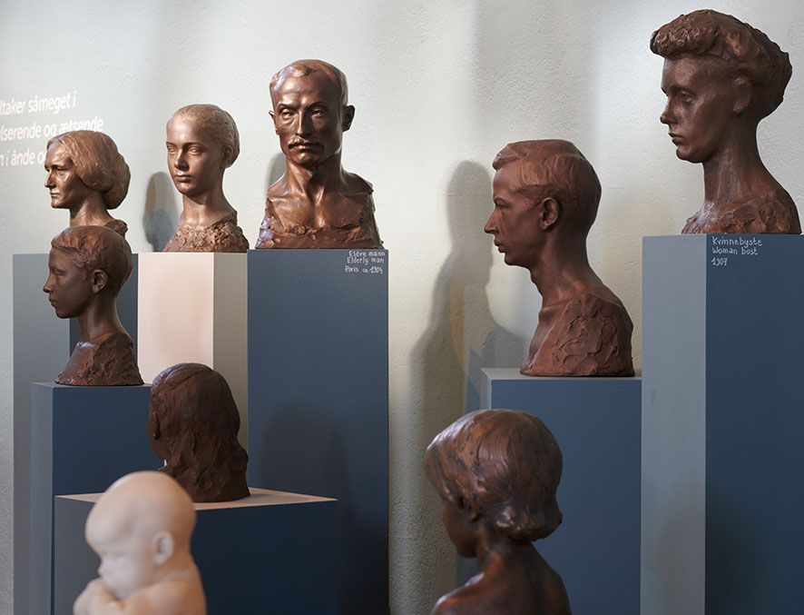 A series of busts exhibited in the Ingebrigt Vik Museum, showcasing portrait art.