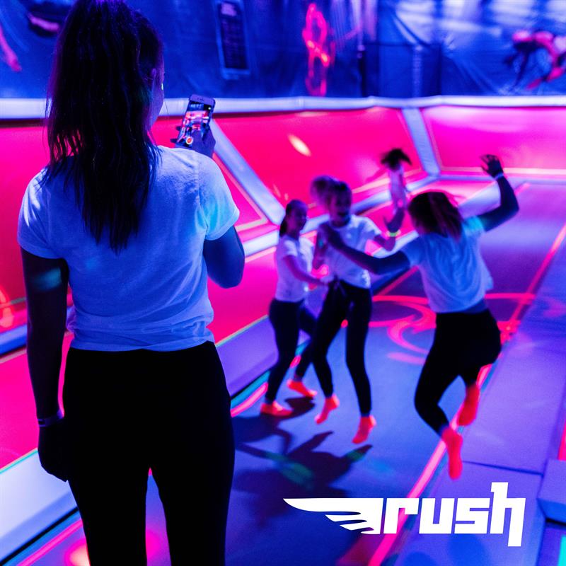 Girls jump at Rush trampoline park
