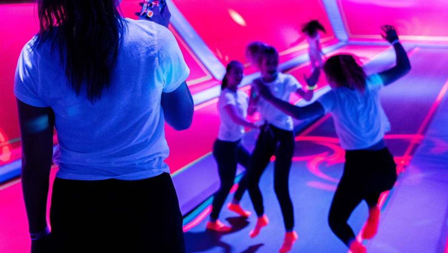 Girls jump at Rush trampoline park