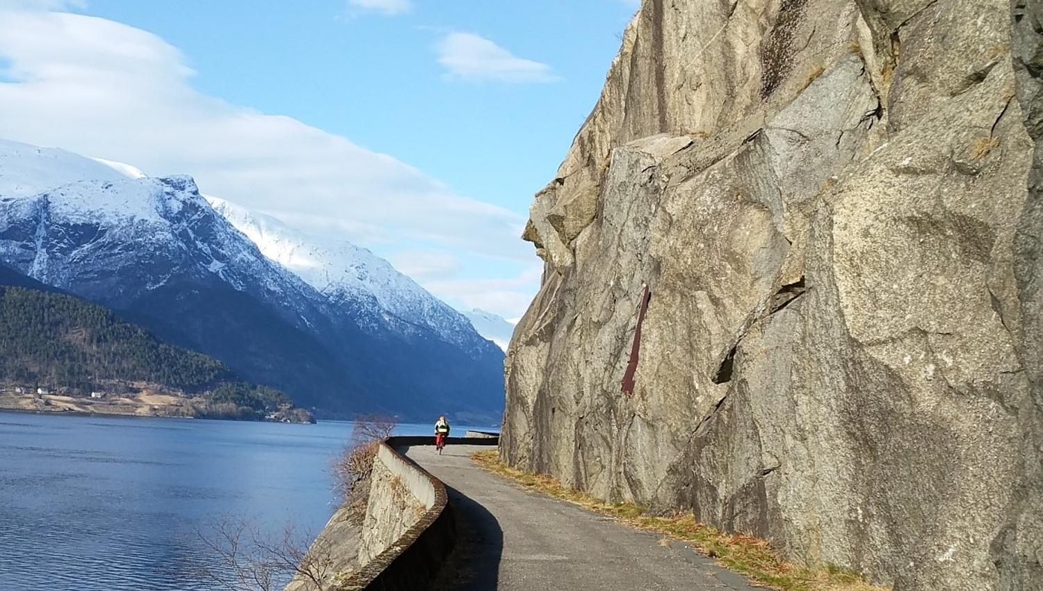 Cycling road along the Hardangerfjord – the iconic route between mountains and fjord near Stana Farm.