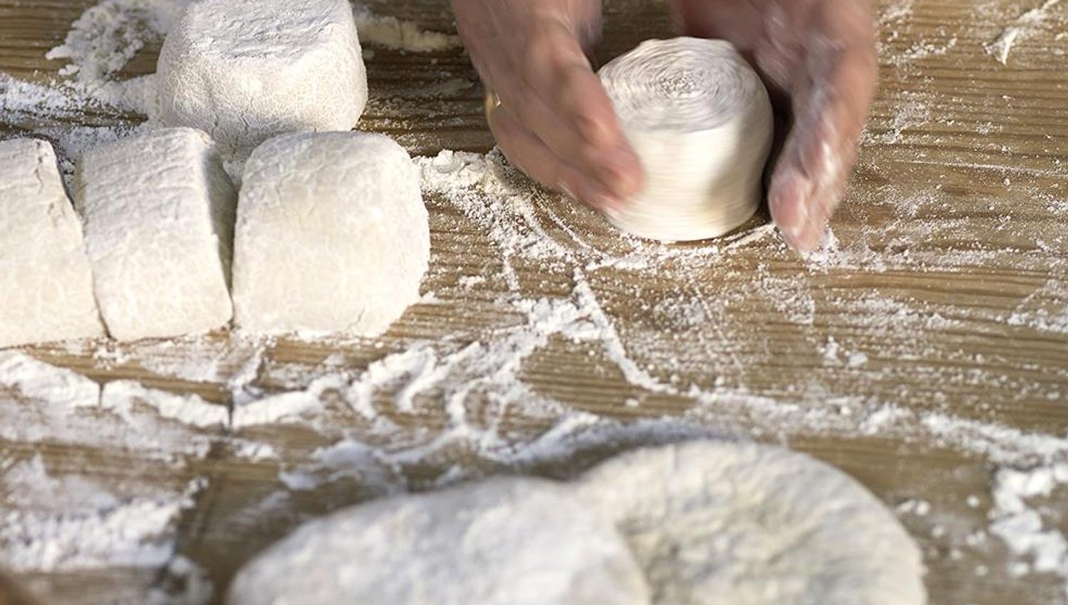 A close up photo of someone shaping "krotakaker"